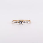 Anillo 3 piedras y laterales